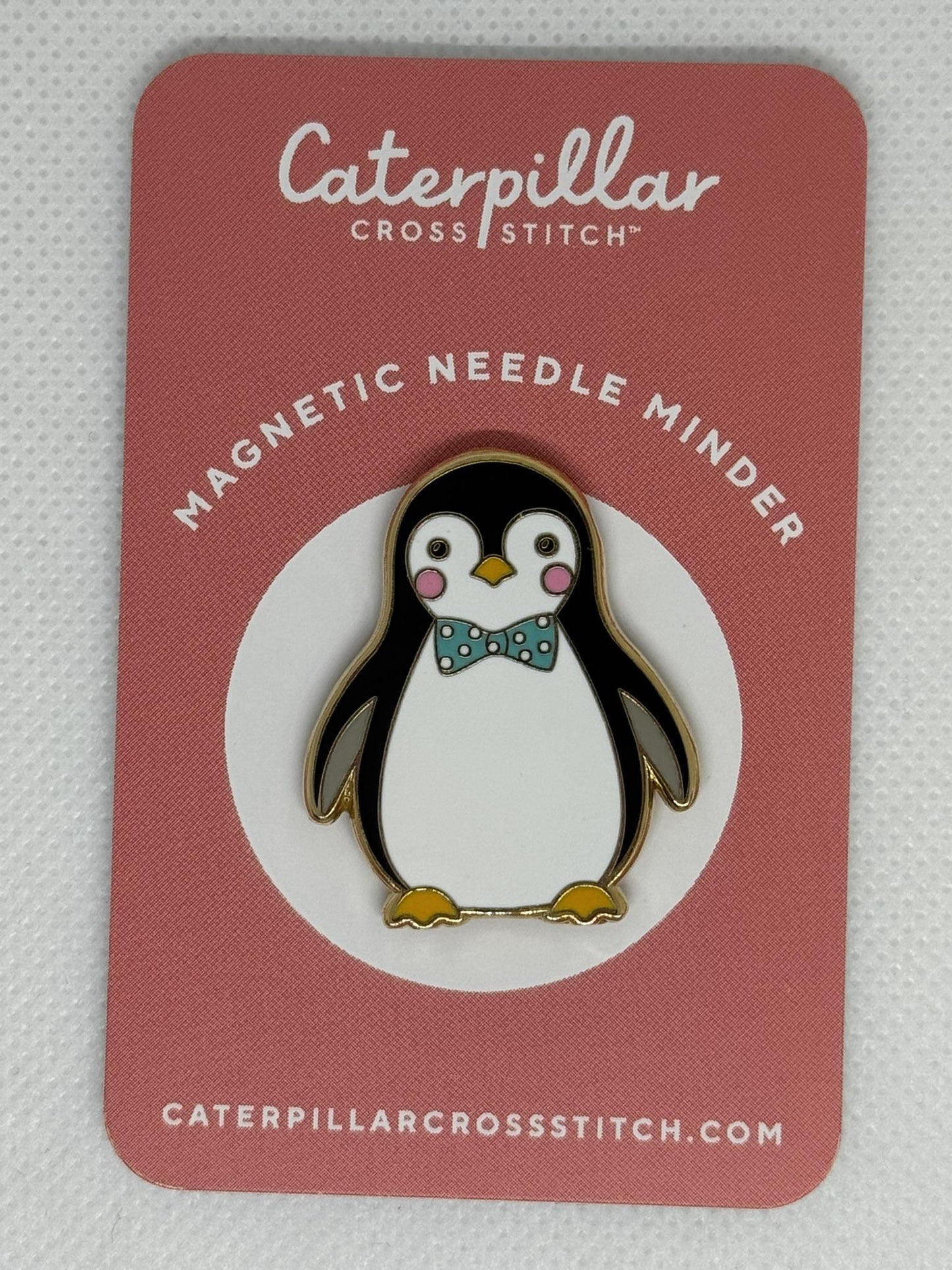 Penguin needle minder