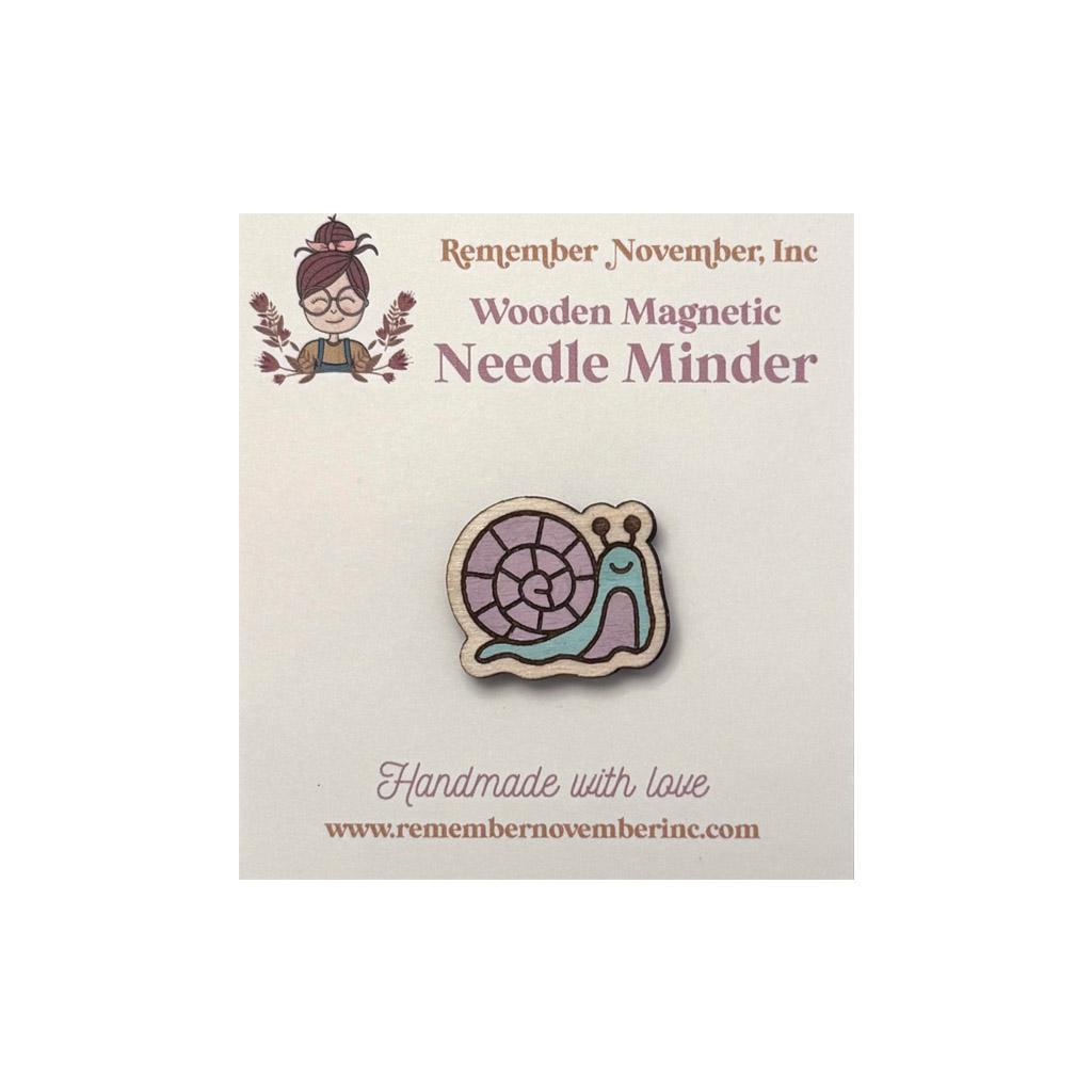 Wooden Snail needle minder