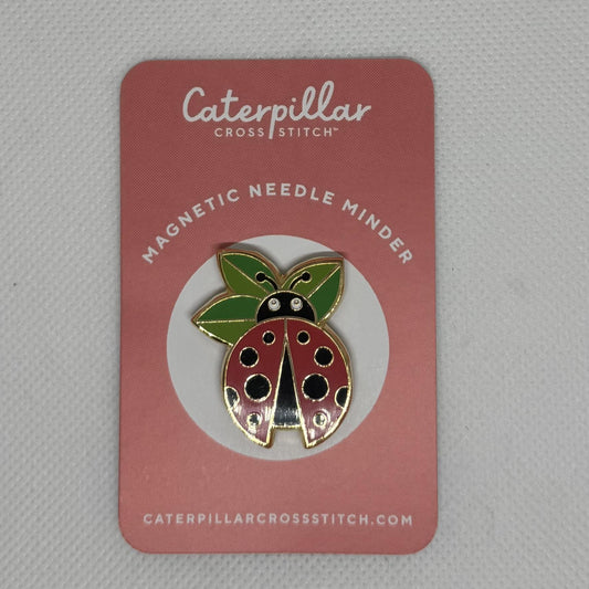 Ladybug needle minder