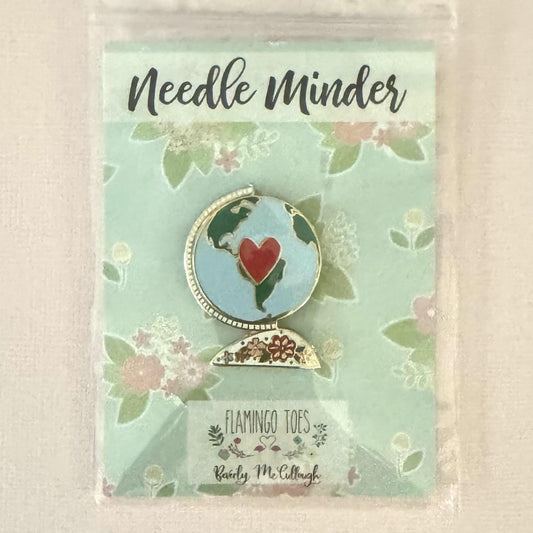 Vintage Globe needle minder